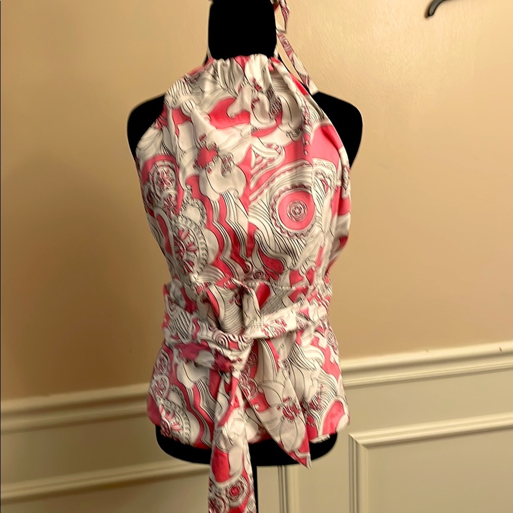 Melly M Boutique sleeveless floral tie back blouse never worn .made in USA